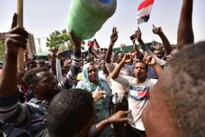 Organisers of protests for the ouster of Sudanese president Omar al-Bashir rejected his toppling by the army Thursday as a coup conducted by the regime and vowed to keep up their campaign. By AHMED MUSTAFA (AFP)