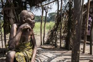 Pauline Ndakpema waits for her family to return from hunting.  By Barbara DEBOUT (AFP)
