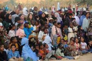 People attend the Sebeiba Festival, a yearly celebration of Tuareg culture, in the oasis town of Djanet.  By - (AFP)