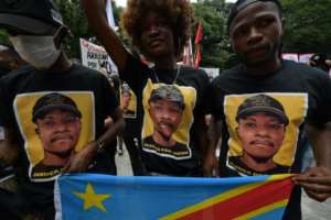 People protest against the killing of 24-year-old Congolese refugee Moise Kabagambe in Sao Paulo, Brazil, on February 5 2022.  By NELSON ALMEIDA (AFP/File)