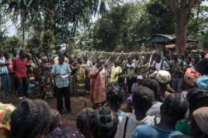 Pierrette Benguere, the head of Mbomou prefecture, speaks to those displaced from Bangassou by the violence.  By ALEXIS HUGUET (AFP)