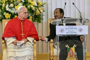 Pope Leo XIV urged an end to the conflict in a pointed speech next to Cameroons President Paul Biya (R).  By Alberto PIZZOLI (AFP)