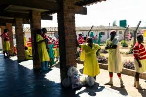 Prisoners sleep on thin blankets on bare cement floors..  By Jekesai NJIKIZANA (AFP/File)