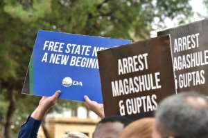 Protest: Members of the opposition Democratic Alliance and Economic Freedom Fighters (EFF) demand a crackdown on graft suspects