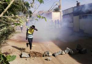 Protests erupted across Sudan in December after a government decision to triple the price of bread. By STRINGER (AFP)