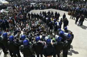 Protests persisted in Algeria after lawmakers appointed a regime stalwart as the country's first new president in two decades. By RYAD KRAMDI (AFP/File)