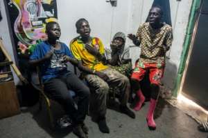 Rap team: Business and friends.  By EMMET LIVINGSTONE (AFP)