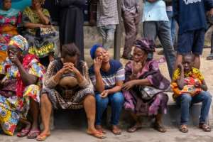 Relatives were desperate for news of those missing a day after the collapse.  By Benson Ibeabuchi (AFP)