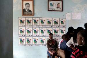 Renamo supporters register in Xai-Xai for the election, which ruling party Frelimo is expected to win.  By GIANLUIGI GUERCIA (AFP)