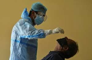 Researchers say the potential for reinfection could impact how governments plan to exit the pandemic.  By TAUSEEF MUSTAFA (AFP/File)