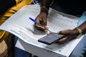 Results were slowly being tallied two days after the election.  By Benson Ibeabuchi (AFP)