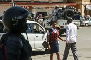 Riot police patrol in Lubumbashi earlier this year