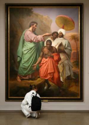 Saint Philip baptising the eunuch of the Queen of Ethiopia on the way from Jerusalem to Gaza by Abel de Pujol is part of the exhibition Black models: from Gericault to Matisse. By FRANCOIS GUILLOT (AFP)