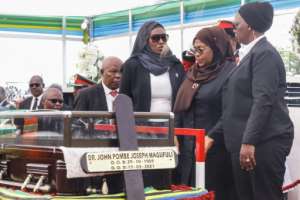 Samia Suluhu Hassan, second right, ascended to the presidency after John Magufulis sudden death in March.  By - (AFP)
