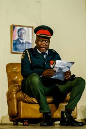 Satire: Zimbabwe€s former army commander General Costantino Chiwenga, played by Charles Munganasa, stuns the Mugabes by announcing the military intervention