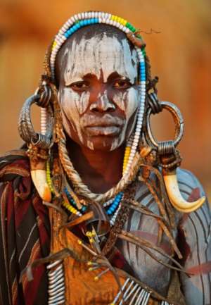 Scientists believe the striped patterns make dark-skinned people less visually attractive to horseflies and other biting insects.  By CARL DE SOUZA (AFP/File)