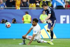 Scott McTominay tries his luck for Scotland.  By FRANCK FIFE (AFP)
