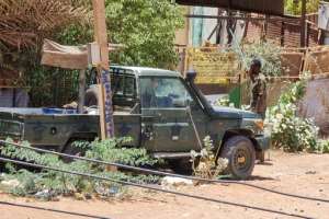 Security forces affiliated with the Sudanese Army man a position in Khartoums Jabra neighbourhood.  By - (AFP)