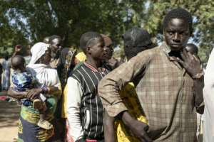 Seven candidates vying to become head of state, including President Faustin-Archange Touadera who is seeking a third consecutive term.  By Mariam KONE (AFP)