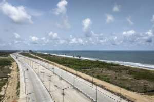 Shrinking coastline, linked to climate change, could threaten the road.  By OLYMPIA DE MAISMONT (AFP)