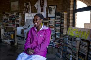 Sindisiwe Zulu, 27, started the book club to help her niece get through school.  By EMMANUEL CROSET (AFP)