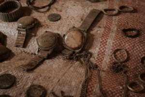Skulls, bones and bags of tattered clothing and accessories found near Gitega await the day when they will become part of a public memorial.  By Yasuyoshi CHIBA (AFP)