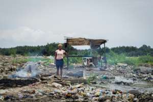 Some residents are still sleeping in the rubble of their former homes.  By Victoria Uwemedimo (AFP)
