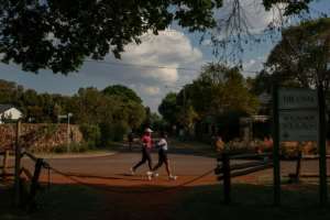 Some women have chosen to run only inside gated communities to avoid the risks of the open streets.  By PHILL MAGAKOE (AFP)