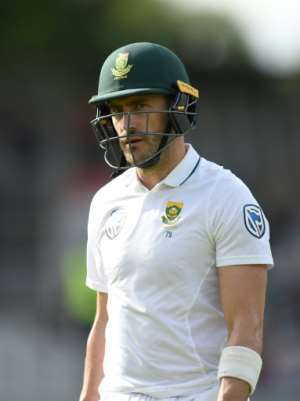 South Africas captain Faf du Plessis leaves the pitch after being dismissed on day 4 of their fourth Test match against England, at Old Trafford cricket ground in Manchester, on August 7, 2017