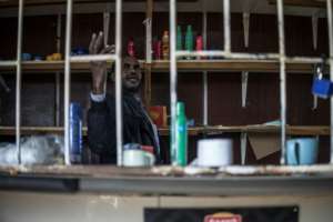 Spaza shops run by foreign nationals were looted or forced to shut during xenophobic unrest.  By MARCO LONGARI (AFP)