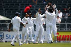 Sri Lanka celebrate the wicket of South Africa opening batsman Dean Elgar (not shown) during the third Test at Wanderers Cricket Stadium in Johannesburg on January 12, 2017