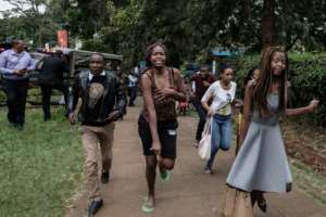 Students fled their campus after the explosion at the nearby hotel and office complex.  By - (AFP)