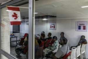 Students prepare for Canadas French comprehension test at the Objectif Canada centre in Douala.  By MARCO LONGARI (AFP)