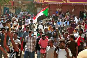 Sudanese protesters in Omdurman, one of several cities where anti-coup demonstrations took place on Monday.  By - (AFP)