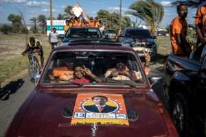 Supporters of Madagascar presidential candidate Andry Rajoelina attend a campaign rally campaign rally on November 4, 2018. If none of the candidates gets more than 50 percent of the votes cast, a second round will be held on December 19.  By MARCO LONGARI (AFP)