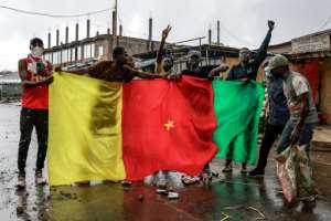 Tchiromas supporters heeded his call to protest against Biyas win.  By - (AFP)