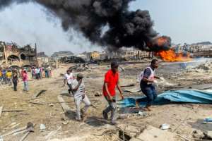 The blast destroyed around 50 buildings in a residential area.  By Benson IBEABUCHI (AFP)