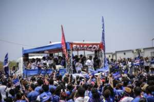 The Blue Sharks parade through the streets of the capital before meeting with the president.  By Jose Correia (AFP)