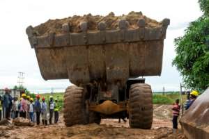 The extracted ore is trucked to the Disele washing plant, about 10 minutes away on a clay road.  By Marthe Bosuandole (AFP)