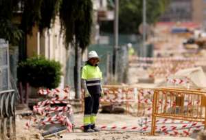 The government has touted the benefits for sectors such as construction that need to boost their workforce.  By OSCAR DEL POZO (AFP)
