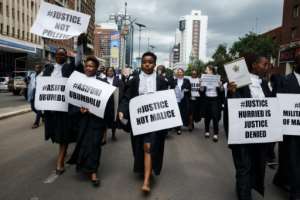 The lawyers are complaining about the fact that judicial process has been cast aside in most trials involving the protesters.  By Jekesai NJIKIZANA (AFP)