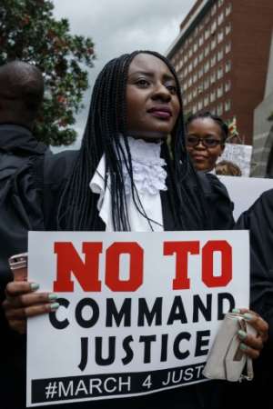 The lawyers delivered a petition to the Constitutional Court calling for a restoration of the rule of law, respect for the constitution and for human rights.  By Jekesai NJIKIZANA (AFP)