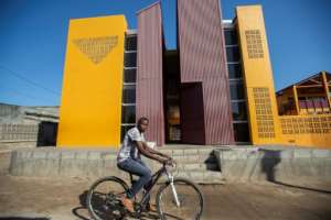 The Mafalala Museum stands out among a sea of sheet metal roofs.  By Alfredo Zuniga (AFP)