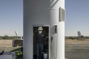 The MeerKAT operates in a radio quiet zone where radiowaves, cell phone signals and wireless connections are strictly controlled to prevent interference with the telescopes tracking.  By MARCO LONGARI (AFP)