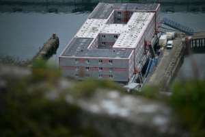 The migrants were reportedly set for removal to the Bibby Stockhom accommodation barge off the southern English coast.  By Ben Stansall (AFP)