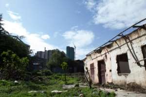 The neighborhood of Kazanches has been marked out as the new business district of Addis Ababa, Ethiopia, and authorities are trying to convince people who live in roofed mud huts, known as chika bets, to move to modern housing
