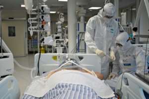 The pandemic has claimed millions of lives and put health systems around the world under acute strain.  By Alberto PIZZOLI (AFP/File)