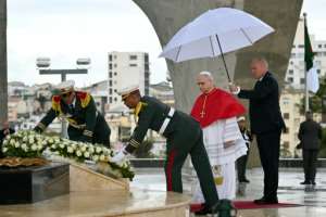 The popes visit came amid heightened tension with France.  By Alberto PIZZOLI (POOL/AFP)
