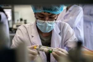 The race for a vaccine is underway across the world.  By NICOLAS ASFOURI (AFP)