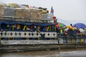 The river vesssls are mostly crammed with more merchandise than people.  By Arsene Mpiana (AFP)